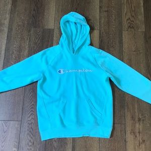 A Champion light blue hoodie